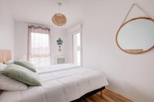 Łóżko lub łóżka w pokoju w obiekcie Très belle appartement haut standing
