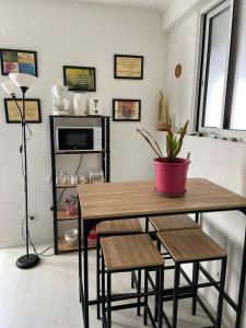 Kuchyňa alebo kuchynka v ubytovaní Chambre chez l’habitant