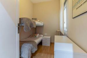 Posteľ alebo postele v izbe v ubytovaní AB Enric Granados Apartment