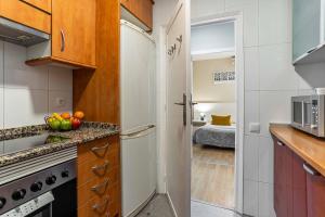 Kuchyňa alebo kuchynka v ubytovaní AB Enric Granados Apartment