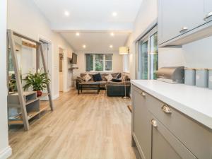a kitchen and living room in a house at The Hideaway in Kingsbridge