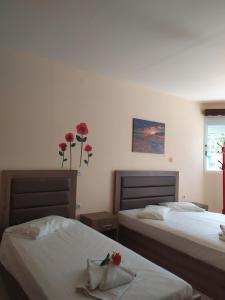 Posteľ alebo postele v izbe v ubytovaní House Stamatis