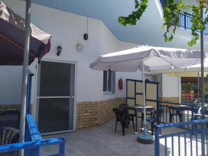 Reštaurácia alebo iné gastronomické zariadenie v ubytovaní House Stamatis