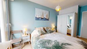 En eller flere senge i et værelse på Panoramic View face Mer