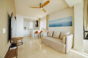 TV a/nebo společenská místnost v ubytování Torre Levante - 23º by Inmobiliaria Milonas