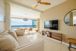 TV a/nebo společenská místnost v ubytování Torre Levante - 23º by Inmobiliaria Milonas