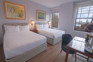 Cama ou camas em um quarto em Hotel Belleclaire Central Park