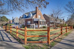 a wooden fence in front of a house at WFH-Friendly Washington DC Vacation Rental! in Washington, D.C.