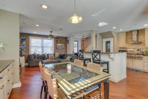 a kitchen and living room with a table and a couch at WFH-Friendly Washington DC Vacation Rental! in Washington, D.C.