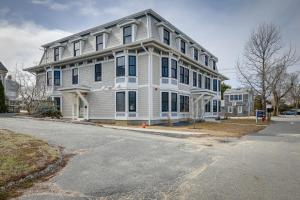 a large white house on the corner of a street at Provincetown Vacation Rental Pet Friendly! in Provincetown