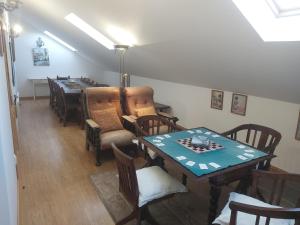 a dining room with a table and chairs at Solar Quinta de São Carlos in Viseu