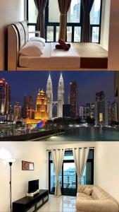 a hotel room with a view of a city at KLCC Kampung Baru Cottage - Homestay in Kuala Lumpur