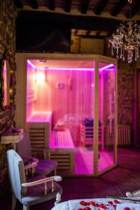 A bed or beds in a room at San Lazzo Luxury Room - ROOM & PERSONAL SPA