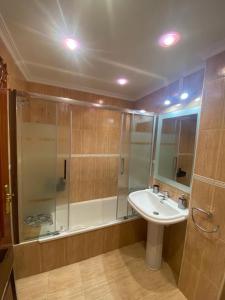 Kúpeľňa v ubytovaní Apartamento en complejo residencial Rovacias