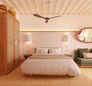 Tempat tidur dalam kamar di Casa Bassa Hotel