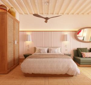 a bedroom with a large bed and a mirror at Hotel Casa Bassa in Valencia