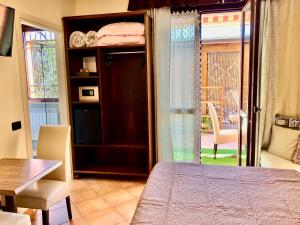 Postel nebo postele na pokoji v ubytování B&B Desenzano Paradise