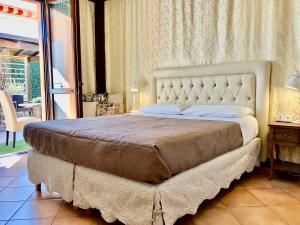 Postel nebo postele na pokoji v ubytování B&B Desenzano Paradise