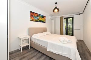 Postel nebo postele na pokoji v ubytování Modern Comfortable Apt at Galata&Istiklal