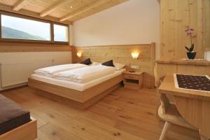Ένα ή περισσότερα κρεβάτια σε δωμάτιο στο Sule Hof Agriturismo +89 φωτογραφίες