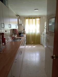 A kitchen or kitchenette at Las Palmas - Hasta 6 Personas