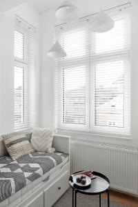 Posteľ alebo postele v izbe v ubytovaní Długa 18 Apartament Premium z antresolą