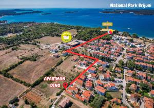an aerial view of a property with a red line around it at Apartman Dino in Fažana