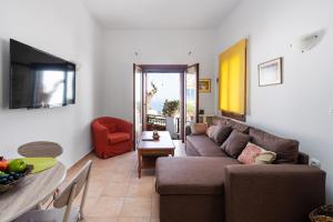 Posezení v ubytování Maisonette in Roussa Ekklisia