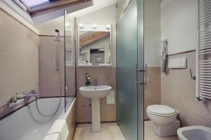 a bathroom with a shower toilet and a sink at Ca' Del Campo in Venice
