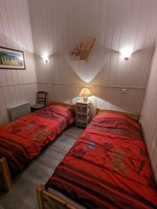 Gîte Aglaéにあるベッド
