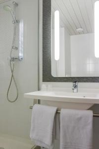 Koupelna v ubytování Hotel ibis Porto Sao Joao