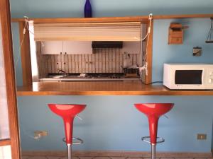 A kitchen or kitchenette at Vacanze a Finale Ligure