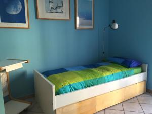 A bed or beds in a room at Vacanze a Finale Ligure