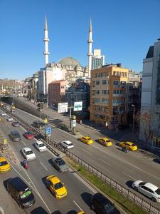 a busy city street filled with cars and buildings at Ava suite teras in Istanbul