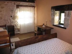 Postel nebo postele na pokoji v ubytování House POJATA