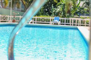 Der Swimmingpool an oder in der Nähe von Condo Rios Resort