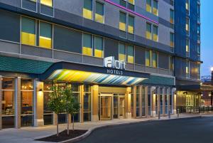 an office building with a sign on the front of it at Aloft by Marriott Louisville Downtown in Louisville +51 photos
