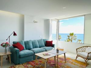 Posezení v ubytování Moderno y completo apartamento frente al mar