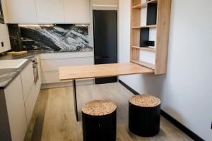 A kitchen or kitchenette at Apartamento VillaRo
