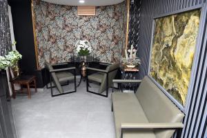 a dining room with a table and chairs at Safir Hotels Silivri in Silivri