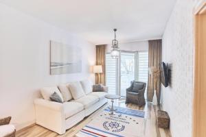 Posedenie v ubytovaní Apartament Riviera z tarasem - Playa Baltis