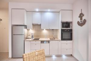 Kuchyňa alebo kuchynka v ubytovaní Apartament Riviera z tarasem - Playa Baltis