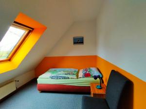 Postel nebo postele na pokoji v ubytování Ferienhaus Groß Popkenhausen