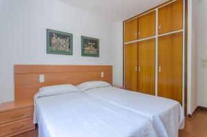 Postel nebo postele na pokoji v ubytování Club Villamar - Briana