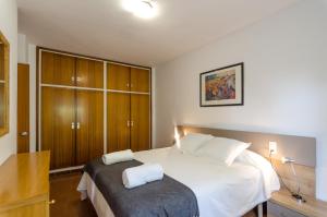 Postel nebo postele na pokoji v ubytování Club Villamar - Briana