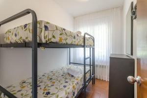 Postel nebo postele na pokoji v ubytování Club Villamar - Briana