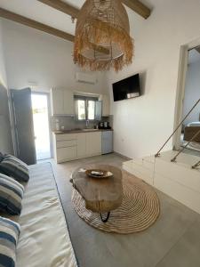 A kitchen or kitchenette at Sohoros Luxury Suites