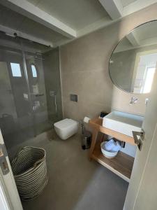 A bathroom at Sohoros Luxury Suites