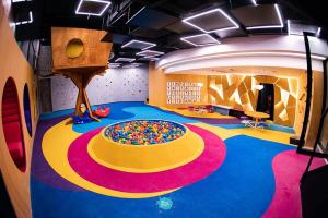 a play room with a large pool of balls on the floor at Hotel Nacional Vista Mar c/ Banheira in Rio de Janeiro