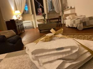 Un ou plusieurs lits dans un hébergement de l'établissement Miro B&B